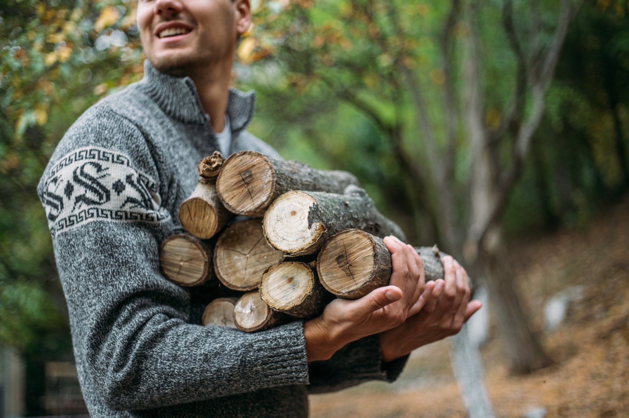 Man Carrying Wood